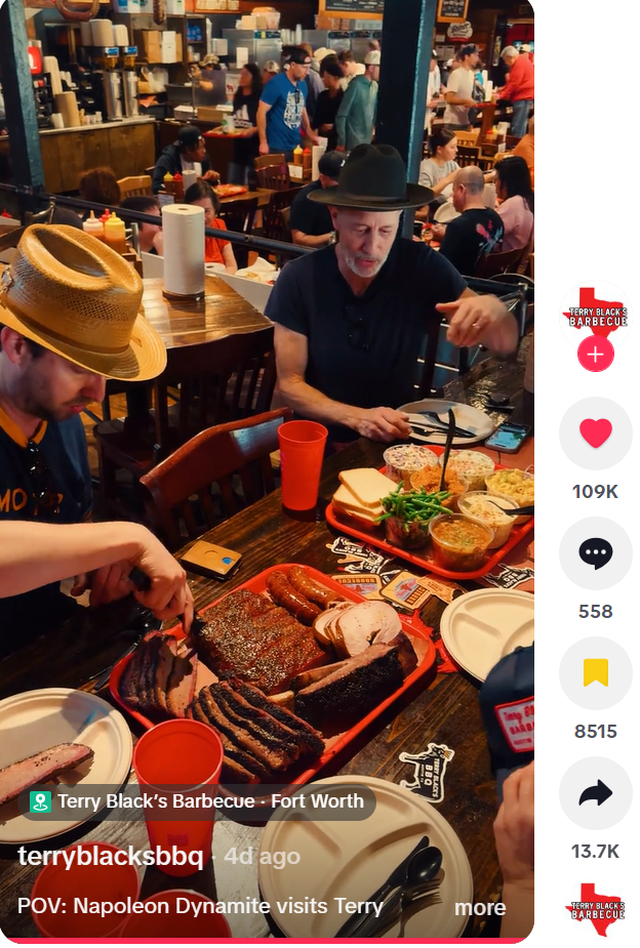 Jon Heder (left) and Jon Gries (right), famously known for their roles in “Napolean Dynamite,” grub on barbecue at Terry Black’s in Fort Worth.